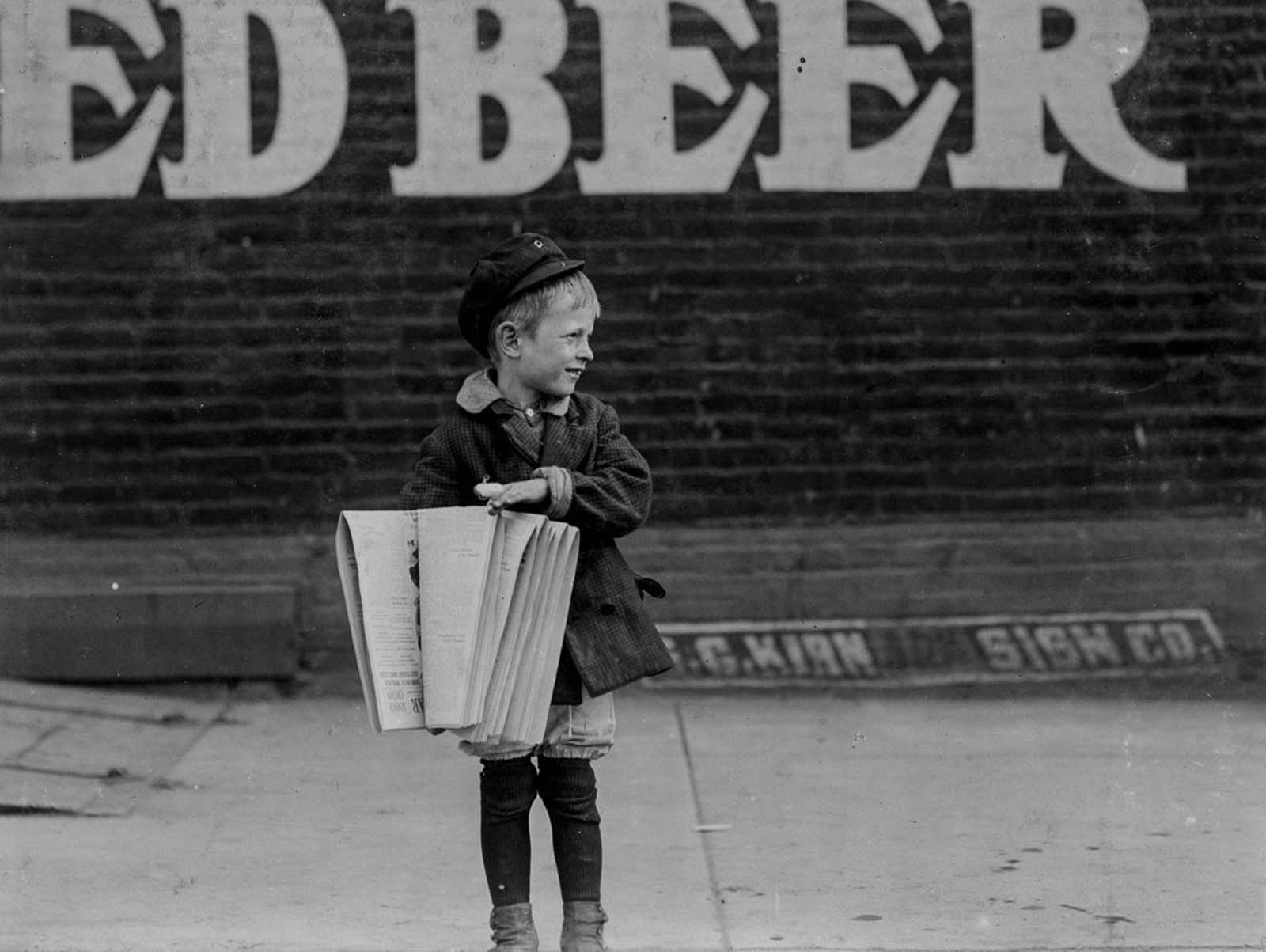 Francis Lance, 5-years-old, 41-inches high. Sells regularly on Grand Avenue. St. Louis, Missouri, 1910.