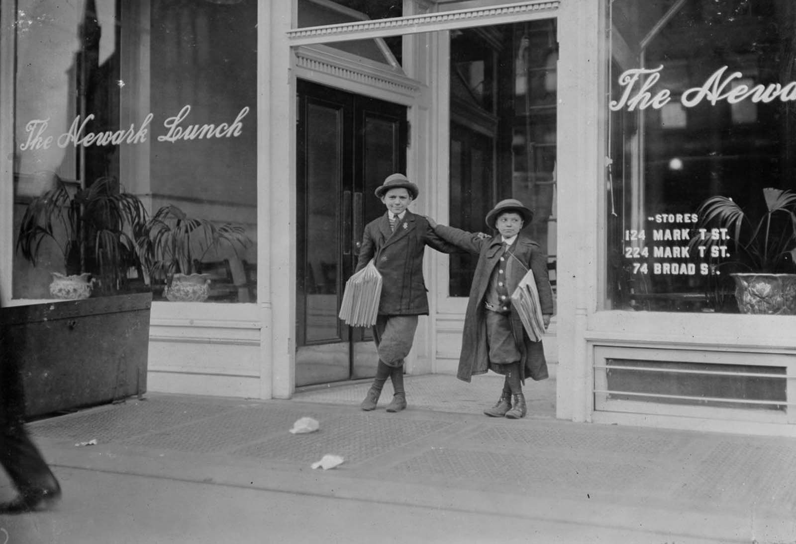 Max Schwartz (8-years-old) and Jacob Schwartz, 163 Howard Street. Sell until 10 p.m. sometimes. Newark, New Jersey, 1909.
