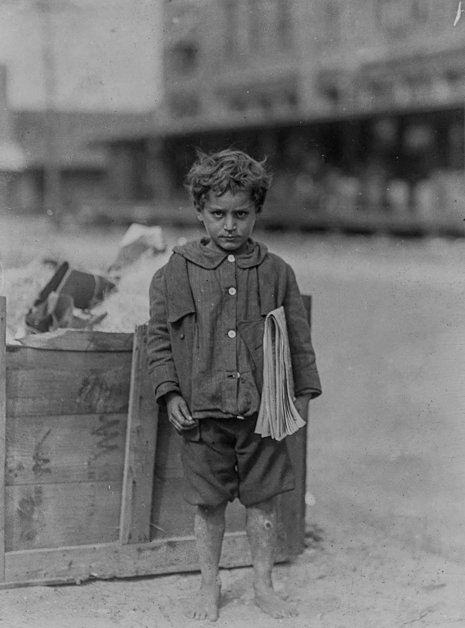 One of America’s youngest newsboys. Four years old and regular seller. Tampa, Florida, 1913.