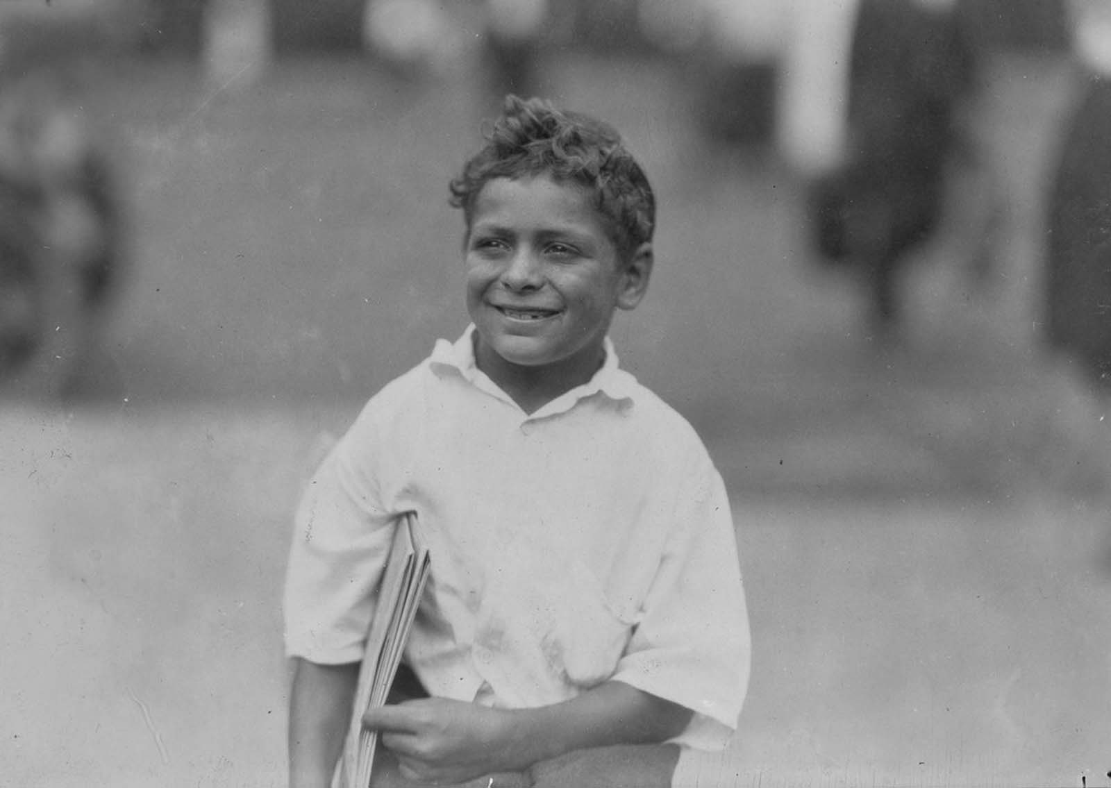 Patsy, 8-year-old newsboy. Says he makes 50 cents a day. Newark, New Jersey, 1924.