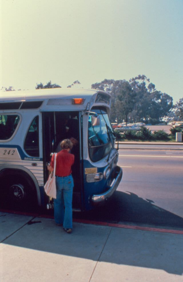 A 1959 GMC bus operating on Route 7 picks up passengers on Park Blvd. near the San Diego Zoo