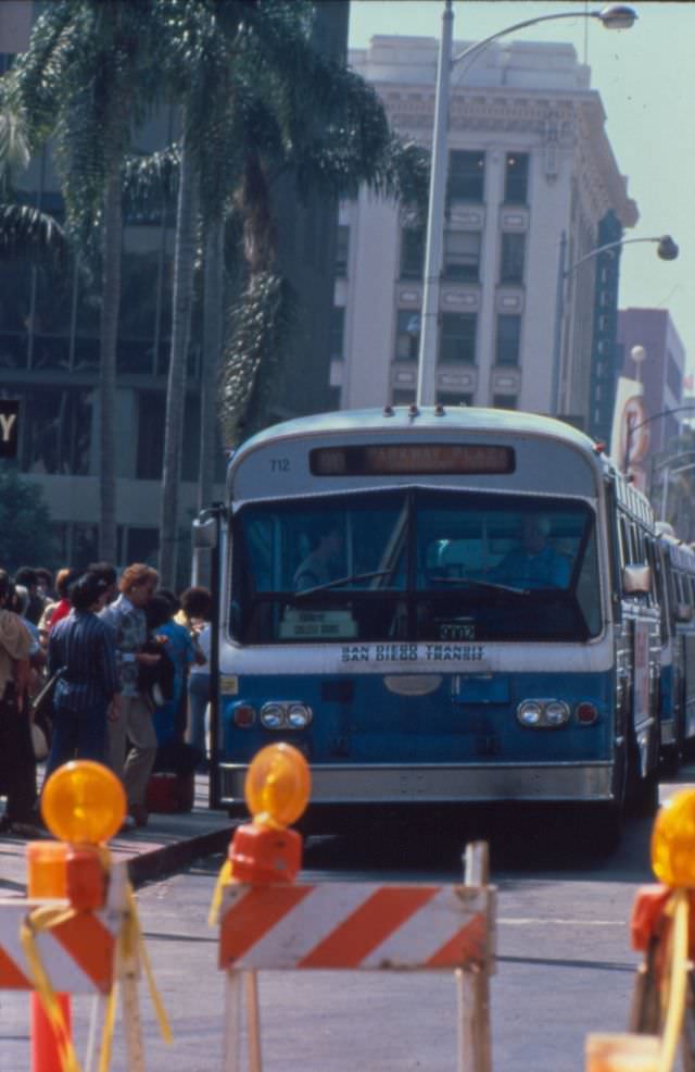 A 1974 Flxible bus operating on Route 90 picks up passengers on Broadway at 4th Avenue (Horton Plaza)