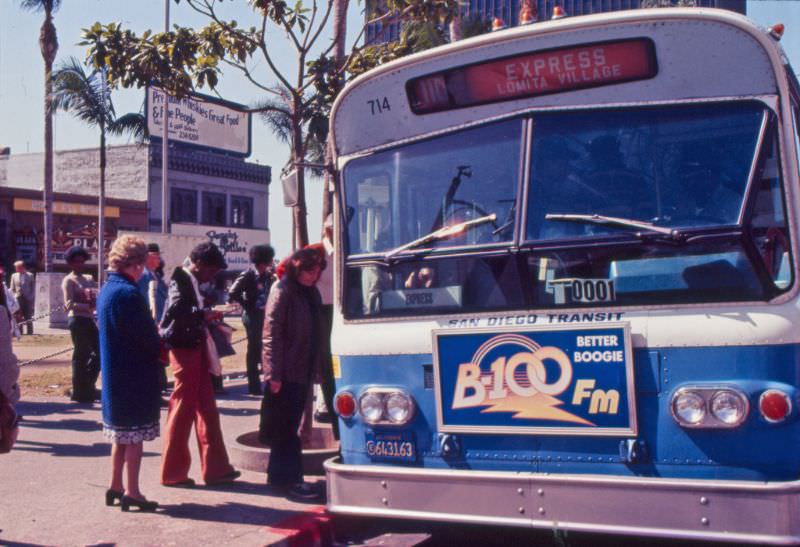 A 1974 Flxible bus operating on Route 110 picks up passengers on Broadway at 4th Avenue (Horton Plaza)