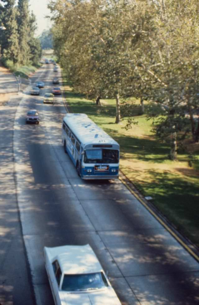 A 1974 Flxible bus travels south on State Route 163 through Balboa Park into Downtown San Diego