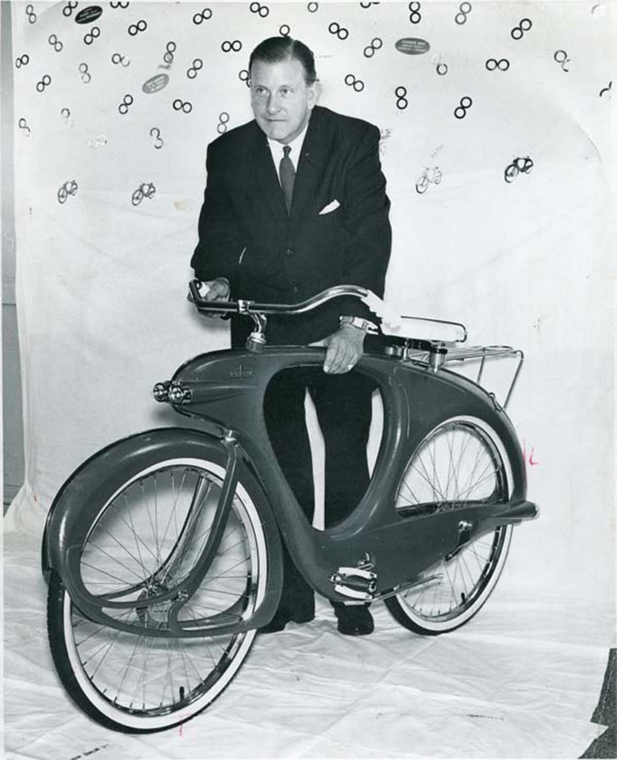 An ordinary pedal bicycle has two wheels that are joined by steel tubes.