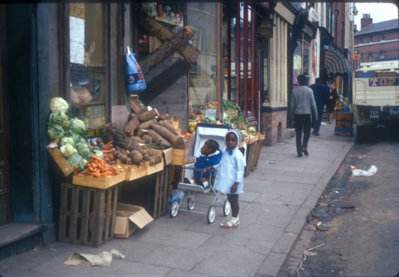 Children outside Eastside Vegetable Shop on Longmore Street, Balsall Heath, 1968