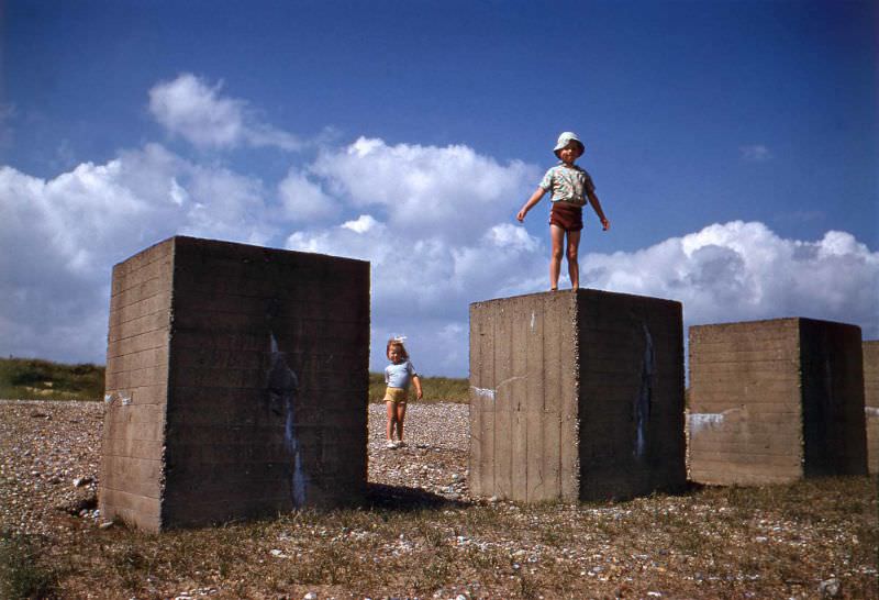 Children and tank blocks at Dunwich, Suffolk