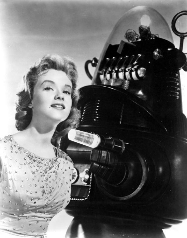 Anne Francis with Robby the Robot During the Filming of 'Forbidden Planet (1956)