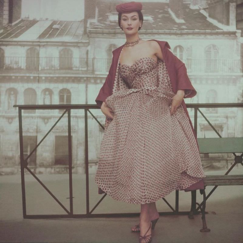 Anne Gunning is wearing Dior's rose printed chiffon with rose silk coat lined in the same print, Vogue, 1953