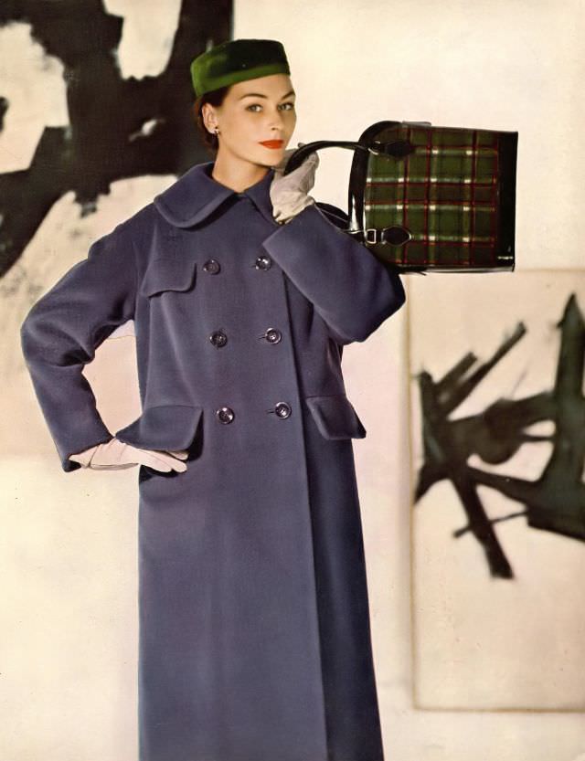Anne Gunning in blue fleece coat, double breasted and flapped pockets by Harry Frechtel, bag by Josef, hat by Gardner, photo by Louise Dahl-Wolfe, paintings by Franz Kline, Harper's Bazaar, 1954
