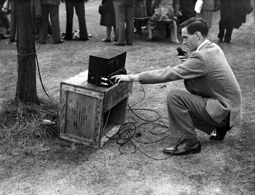 London Olympic Games 1948. A radio outside-broadcaster prepares his equipment.