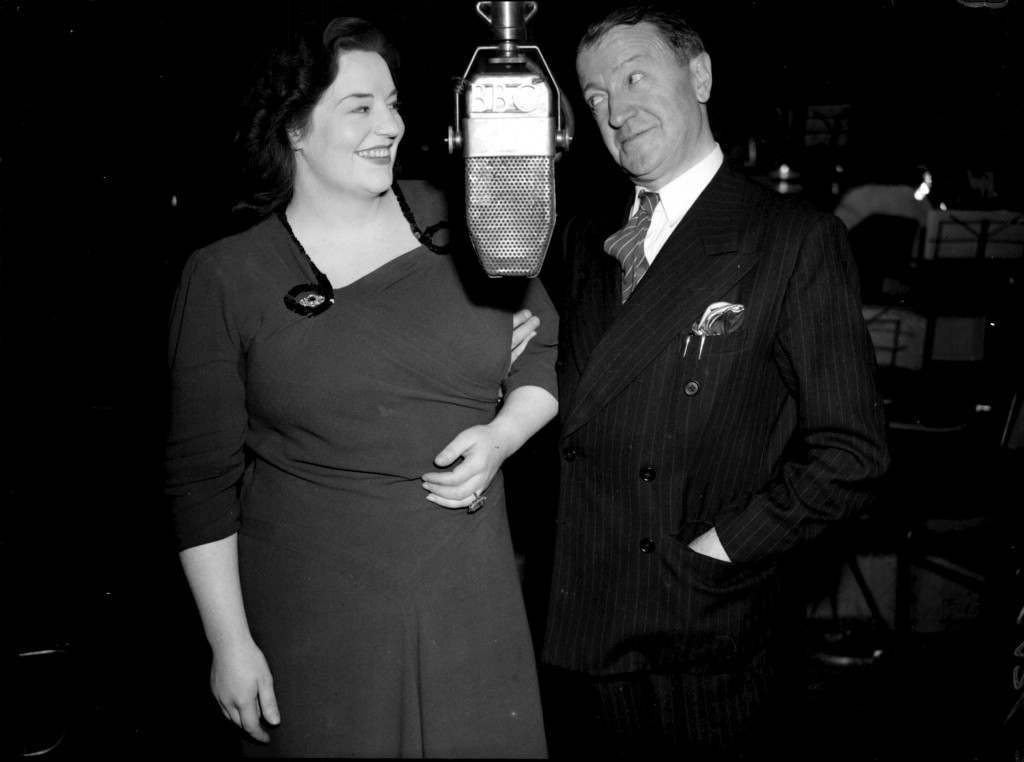 Tommy Handley and Hattie Jacques, during rehearsals for the radio show “ITMA” in London, 25th September 1947.