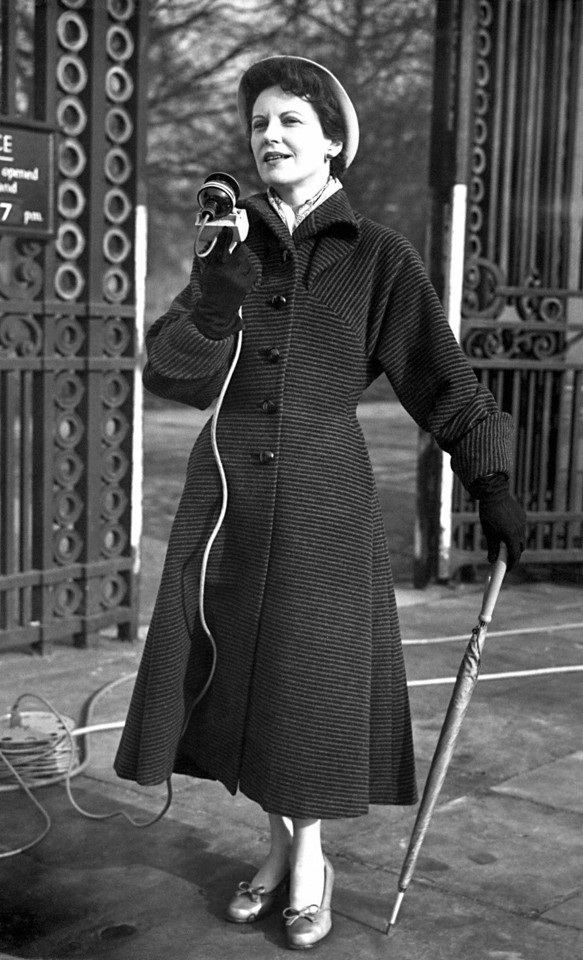 Microphone and umbrella in hand, Manchester born broadcaster Jessica Dunning makes an outside broadcast in an audition for commentators for the Coronation.