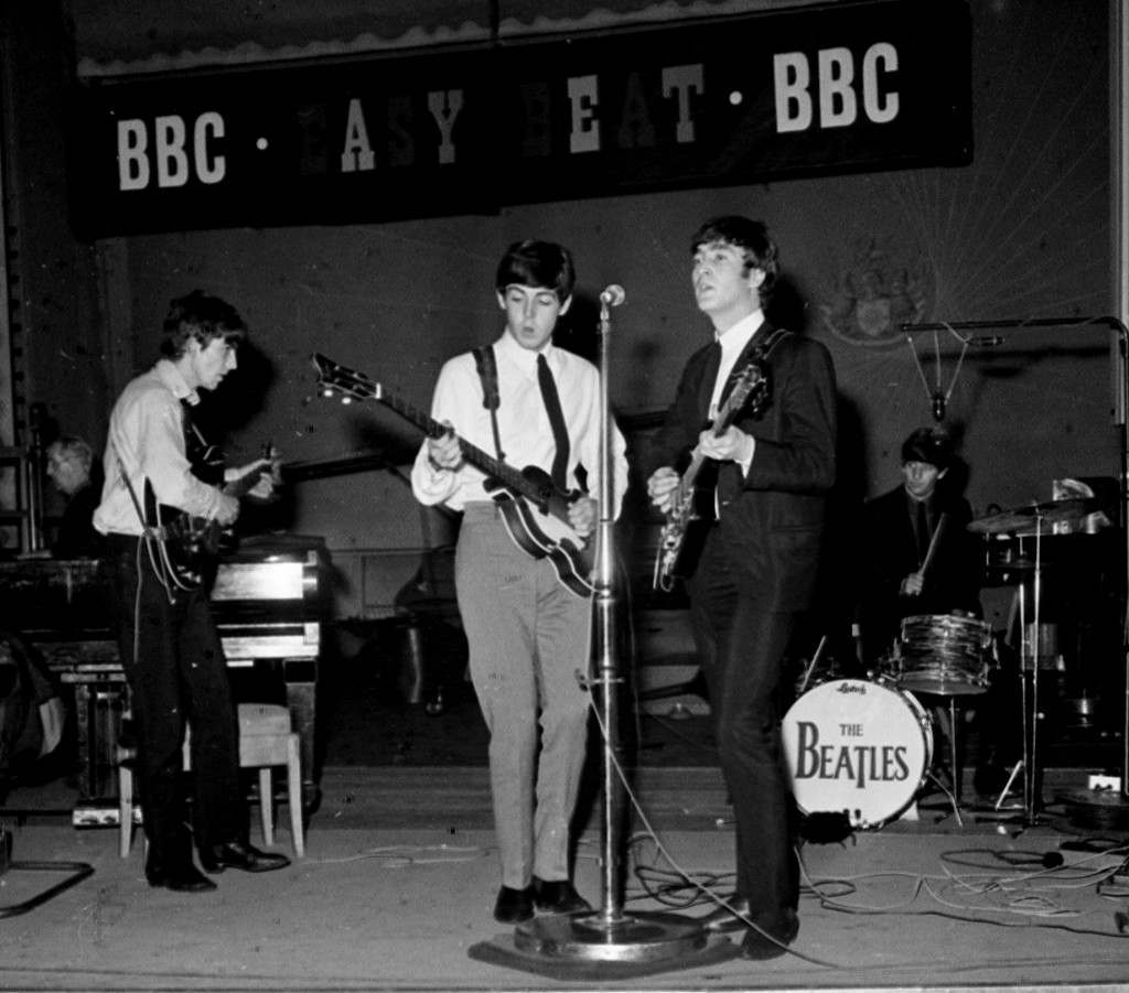 The Beatles singing together during a recording session for the BBC radio programme ‘Easy Beat’