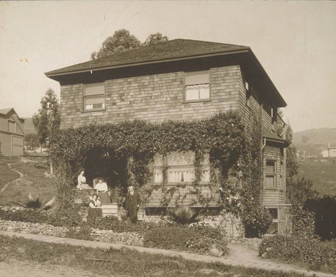 A family outside of residence. Berkeley, 1920s