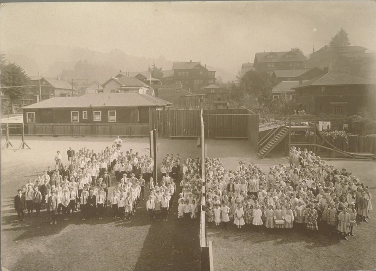 Schoolyard portrait of pupils. Unidentified school in Berkeley, 1920s