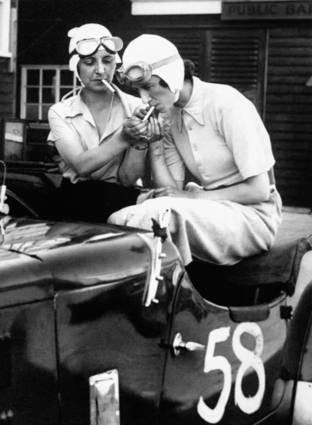 Mrs Gordon Simpson and the young racing driver Joan Richmond sitting in the latter’s 1921 3-litre GP Ballot racer, July 1934.