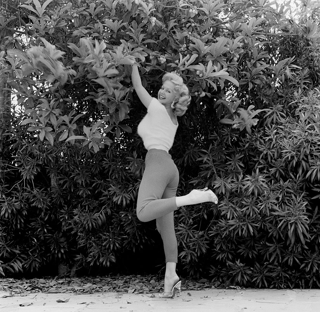 Greta Thyssen plucking from the tree, 1956.
