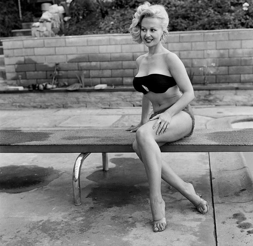 Greta Thyssen posing on the bench, 1955.