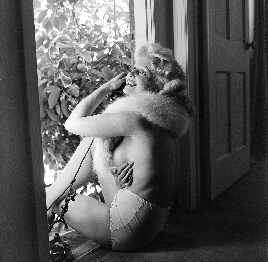 Greta Thyssen posing in front of the window, 1955.
