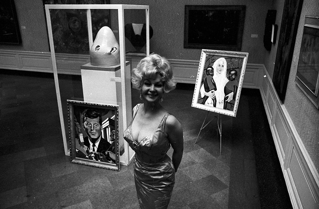 Greta Thyssen standing in an art gallery, 1965.