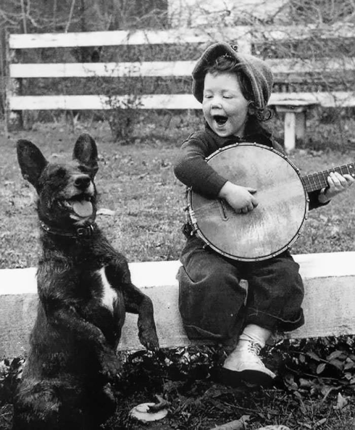 Girl playing for her dog