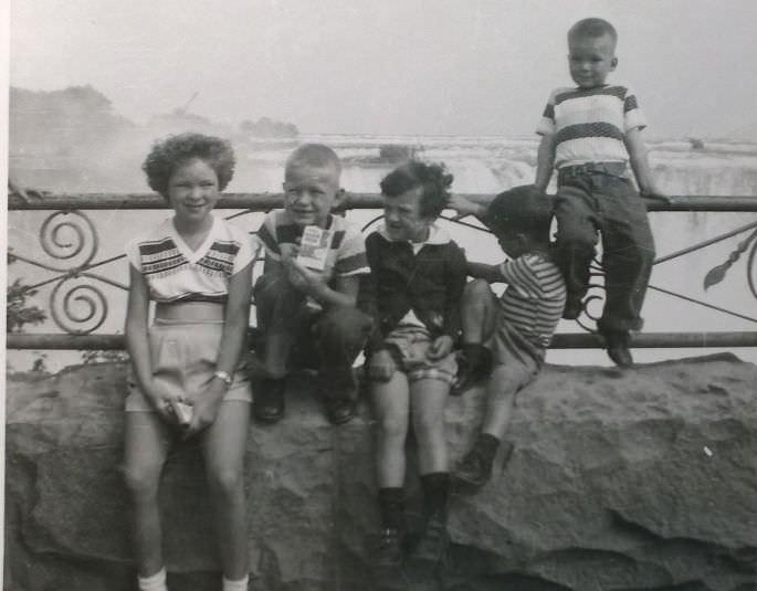 Me, sitting on the rail at niagra falls in 1956.