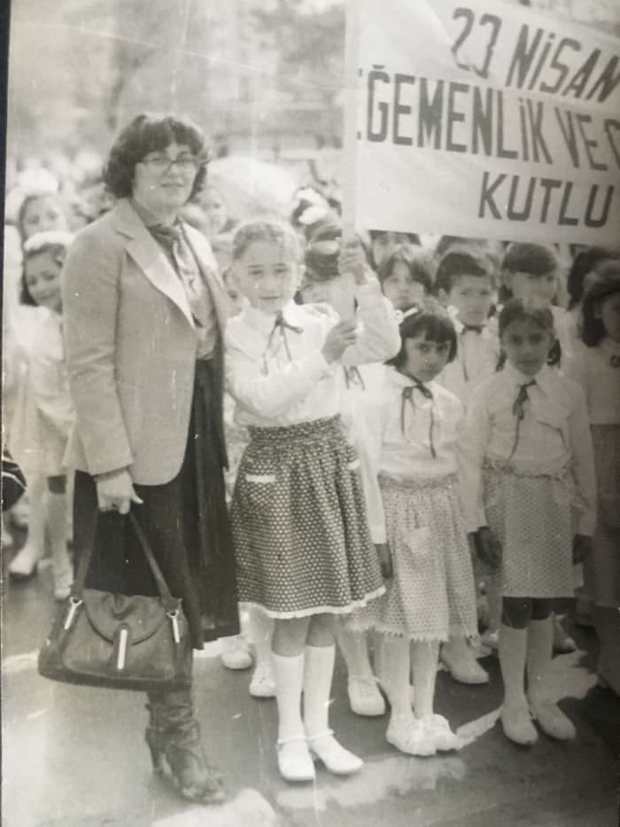 Young students celebrating the national sovereignty and children's day in turkey, april 24, 1970s