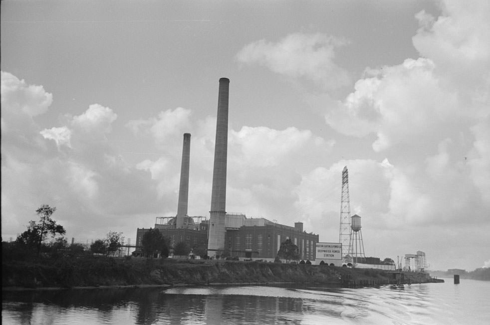 Along the banks of the Port of Houston are several crushing plants for oyster shell. Oyster shell products are used for cement, roads and fertilizer. Houston, Texas]