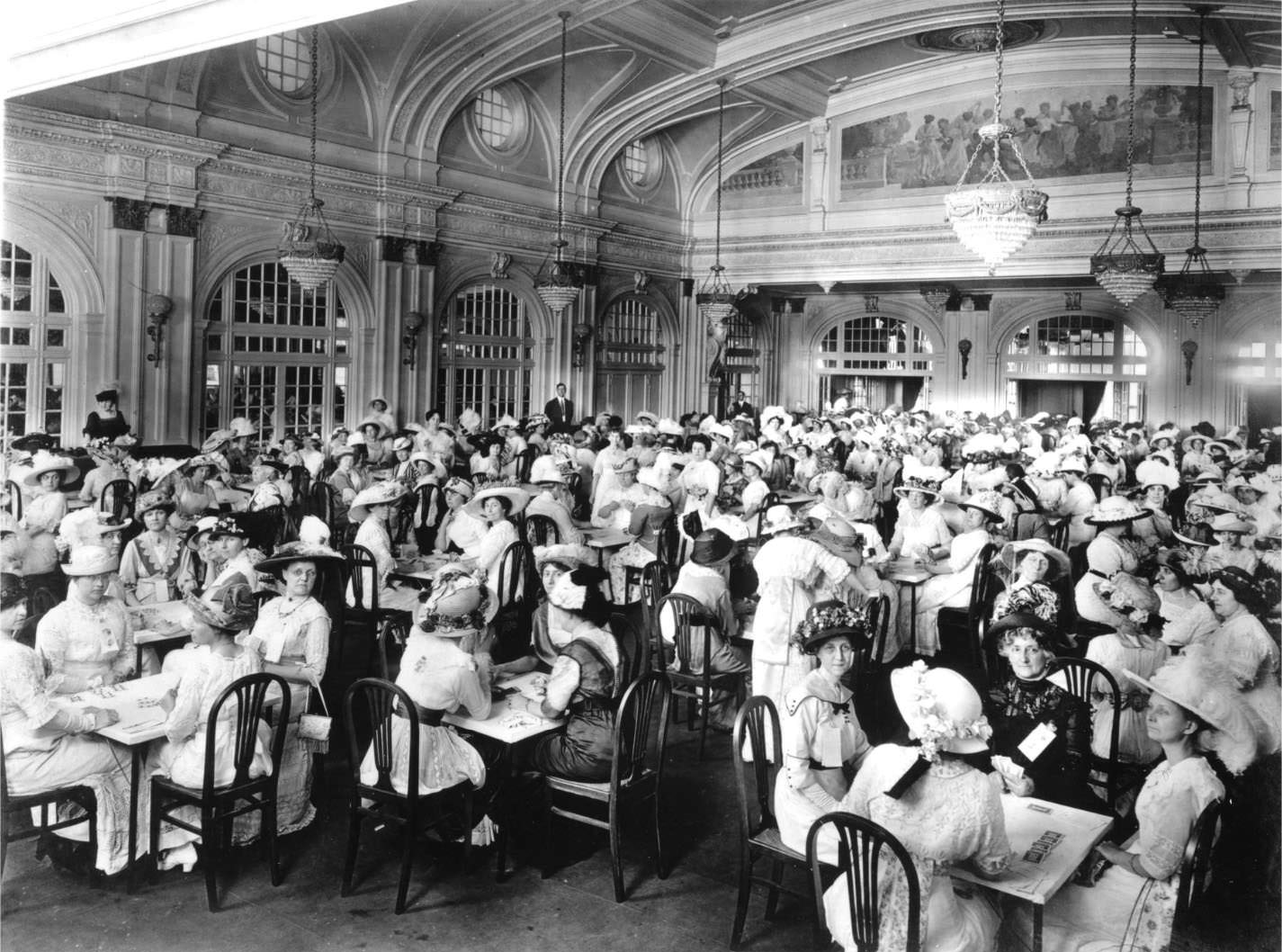 Large ladies' bridge party in the ballroom of the Rice Hotel, Houston, 1930s.