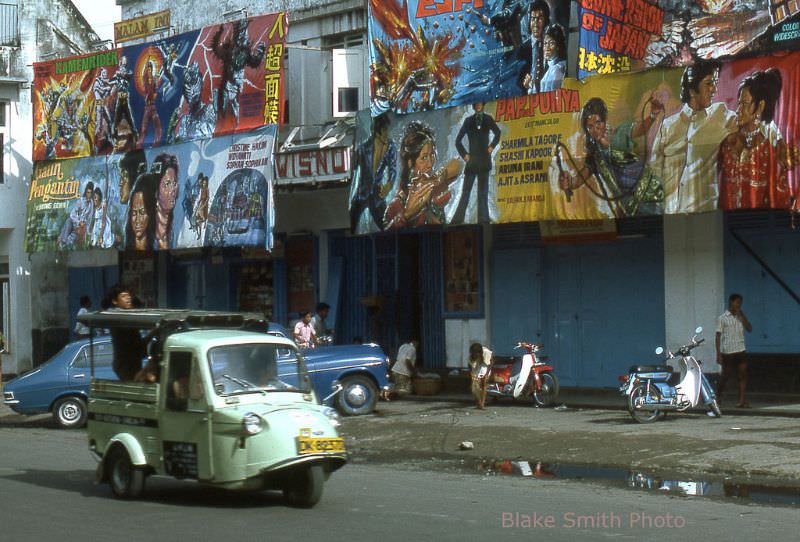 Colorful movie billboards on Denpasar street, Bali, 1970s