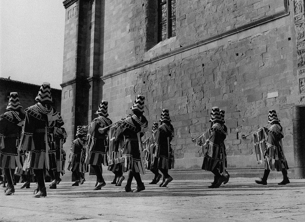 Trumpeters running through the streets of the city during the Saracen Joust, Arezzo, 1960s.
