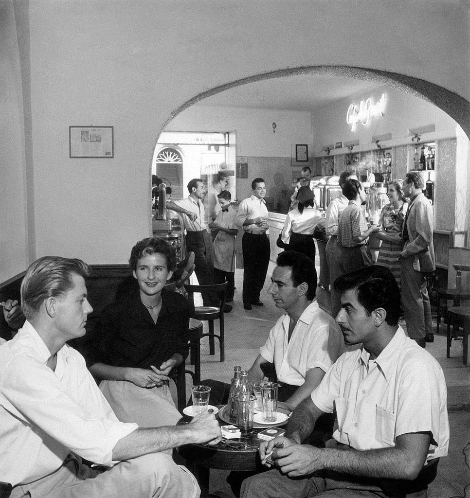 People relaxing at the Baretto on via del Babuino, Rome, 1960s.