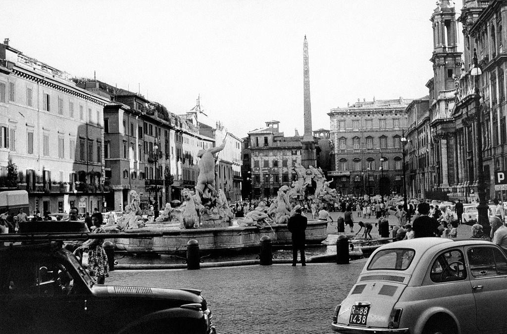 Piazza Navona with the Fountain of Neptune in the foreground and the Fountain of the Four Rivers in the background, Rome, 1960s.