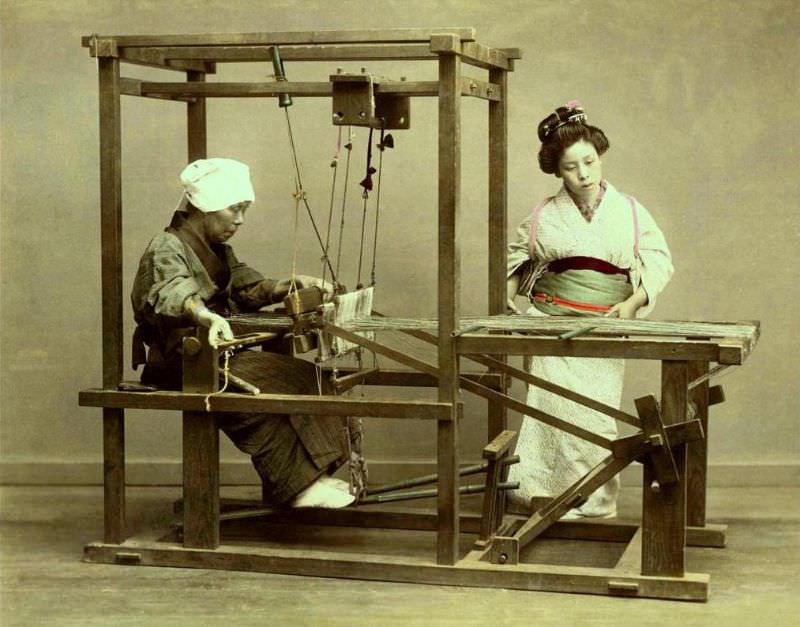 Two women at a loom in old Japan