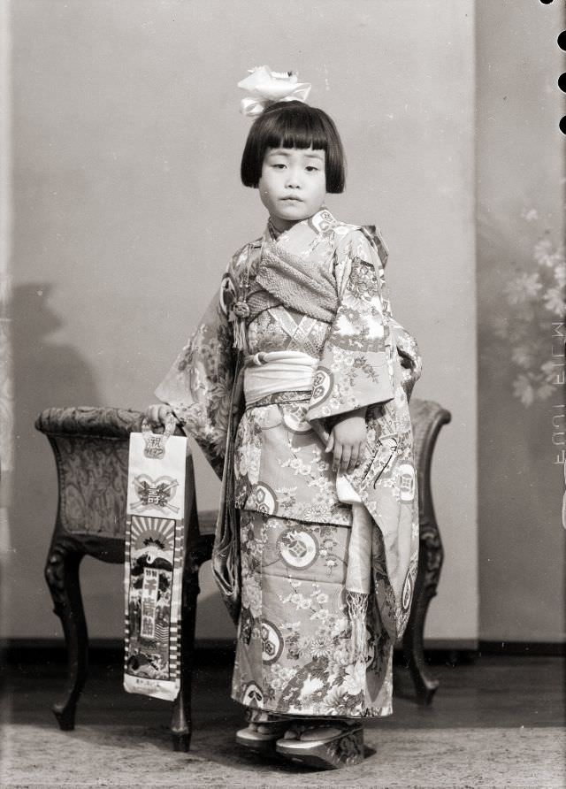 A Japanese girl in a kimono and wooden sandals