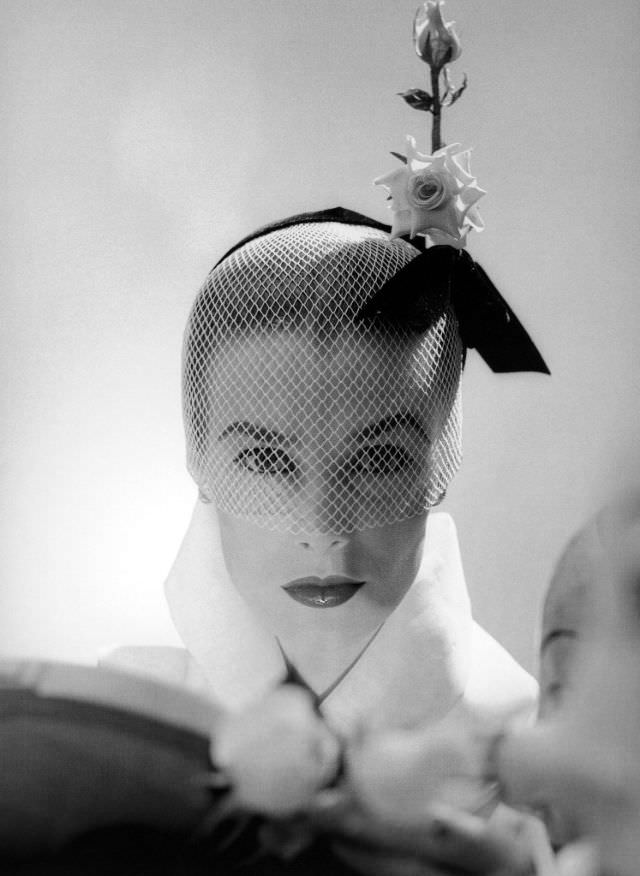 Lillian Marcuson in veiled hat by Lilly Dachè, Life, February 12, 1951