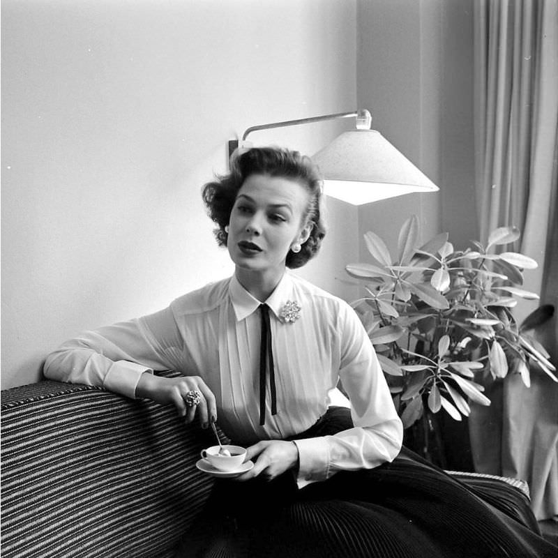 Lillian Marcuson is wearing a pleat-front shirt from Brooks Brothers, 1954