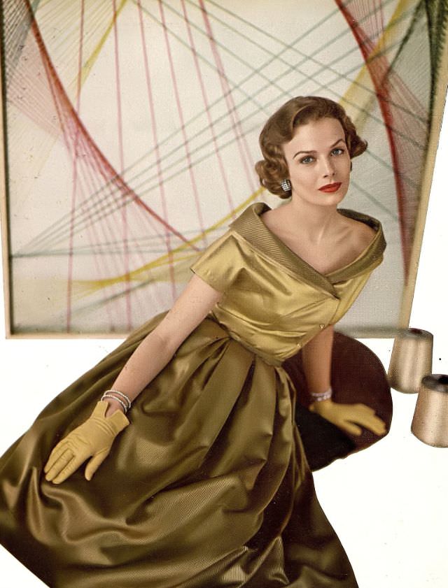 Lillian Marcuson in two tones of Celanese rayon satin and satin corduroy, dress by Toni Owen, Harper's Bazaar, October 1950