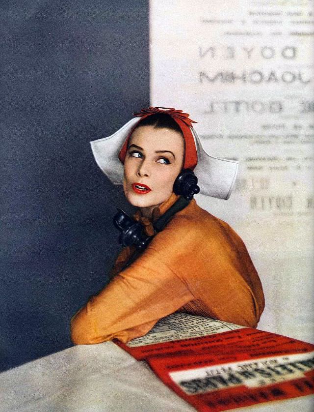Lillian Marcuson wearing a winged cap of white paper straw with band of rust grosgrain after Dior by Vernier, Harper's Bazaar, April 1950