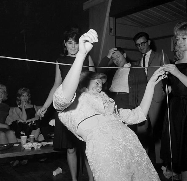 Young Women Performing the Limbo Dance at a Los Angeles Night Club in 1964