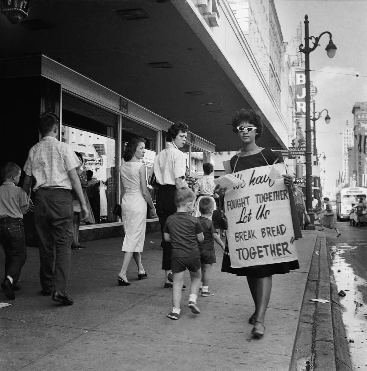 Junienne Briscoe, 16 years old, joined the picket lines along Main Street.