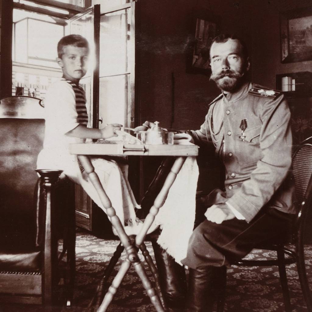 Nicolas sharing breakfast with his son Alexei in 1909.