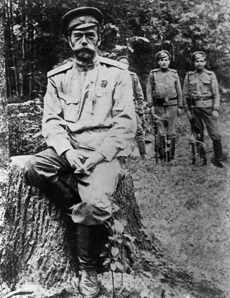 Nicholas II, in exile and guarded by Russian soldiers.