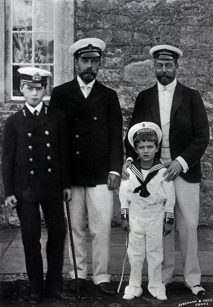 King Edward VIII (l) and Nicholas II, Emperor of Russia, stand with their sons, Prince George V and Czarevitch Alexei, respectively, at Cowes, England.