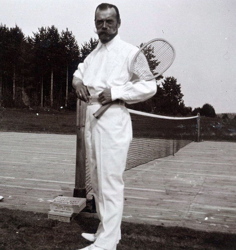 Nicholas II with a tennis racket.