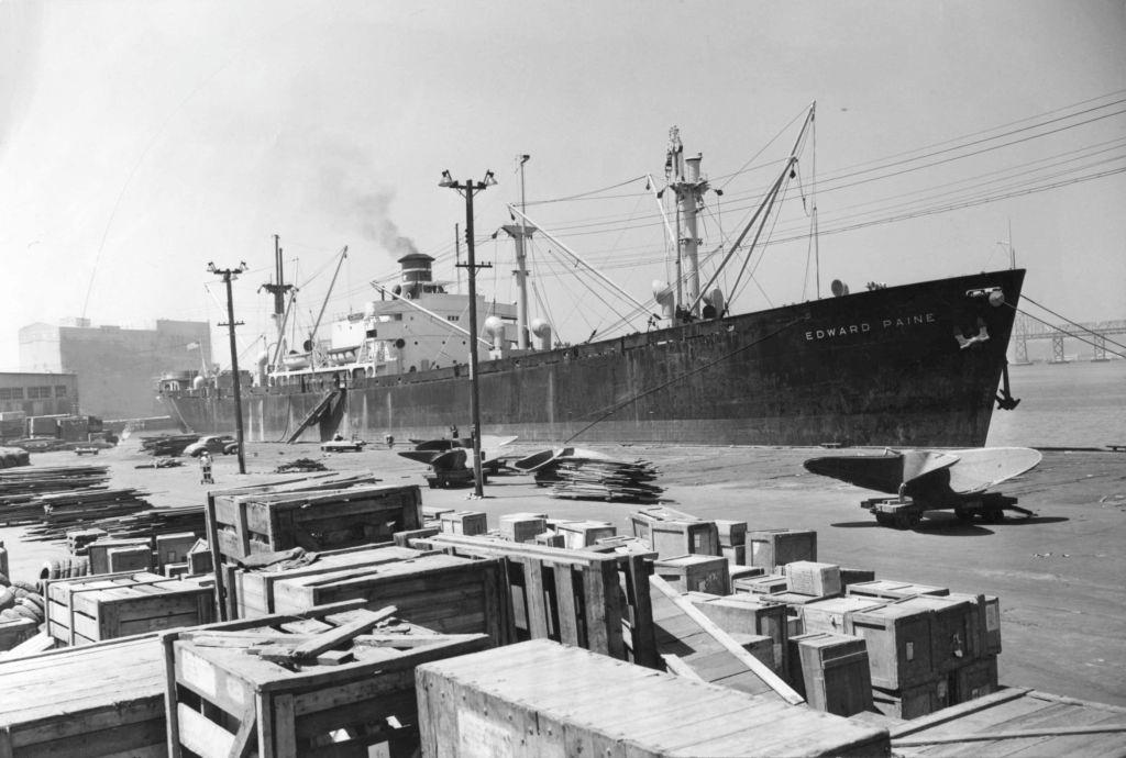 Incoming and outgoing freight is piled high on the wharf of the Port of Oakland Outer Harbor, 1947.