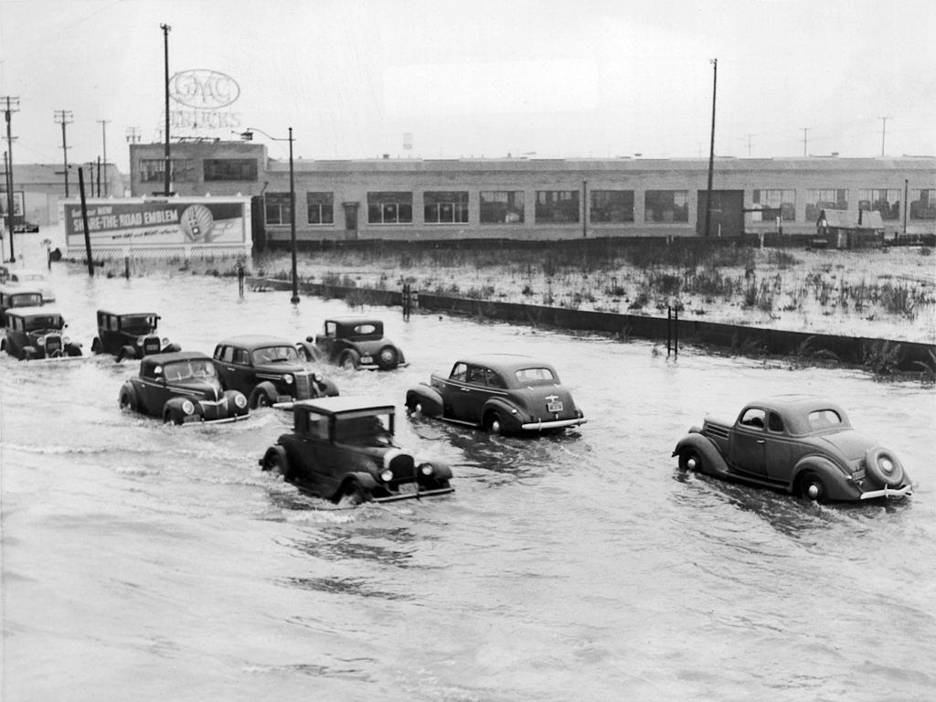 Car Traffic on a Flooded Road in Oakland, 1940s.