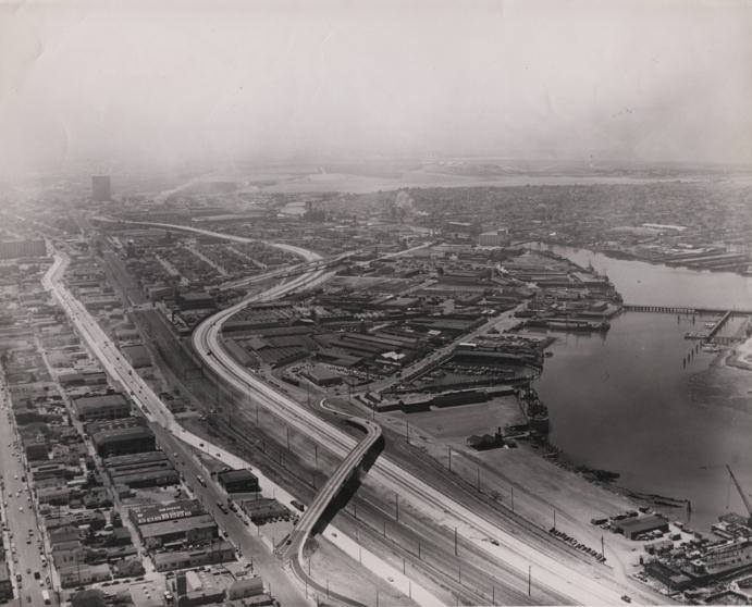 Aerial view, looking south from around 16th Avenue, of the Nimitz Freeway, 1940s