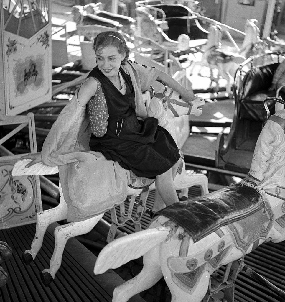 Roundabout in a fun fair, 1935.